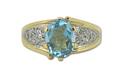 Lot 304 - Topaz and Diamond Ring.
