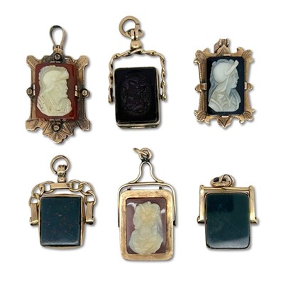 Lot 454 - A Collection of Fob Charms.