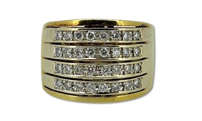 Lot 394 - A Wide Diamond Set Ring.