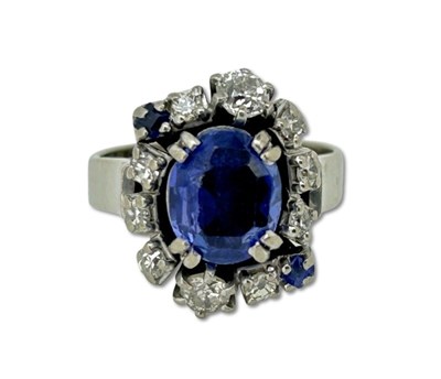 Lot 333 - Sapphire and Diamond Ring.