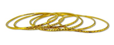 Lot 343 - Six Gold Bangles.