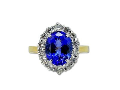 Lot 408 - Tanzanite & Diamond Ring.