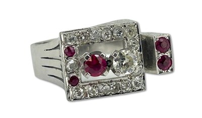 Lot 411 - Ruby and Diamond Ring.