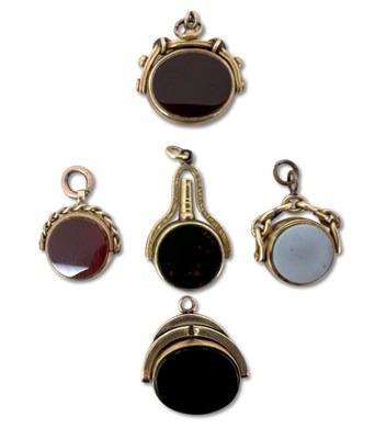 Lot 379 - Five Large Spinner Fob Charms.