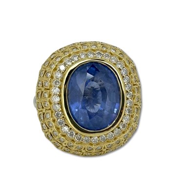 Lot 324 - Ceylon Sapphire & Diamond Ring.