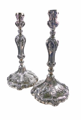 Lot 482 - Pair George II Sterling Silver Rococo Style Candlesticks