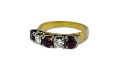 Lot 323 - Classic Eternity Ring.