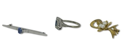 Lot 248 - Two Brooches and a Sapphire Ring.