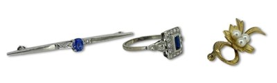 Lot 248 - Two Brooches and a Sapphire Ring.