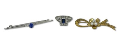 Lot 248 - Two Brooches and a Sapphire Ring.