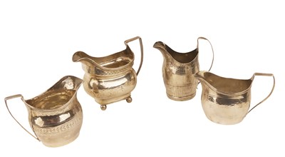 Lot 443 - Four Sterling Silver Milk Jugs.