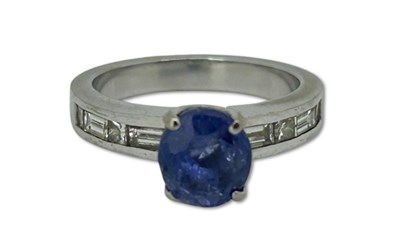 Lot 347 - A 2.49CT Sapphire and Diamond Ring.