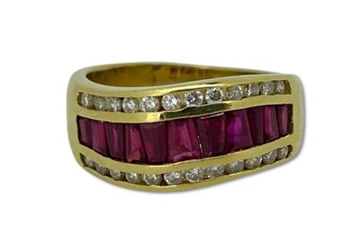 Lot 321 - Ruby and Diamond Dress Ring.