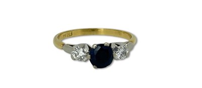 Lot 261 - Petite Three Stone Ring.