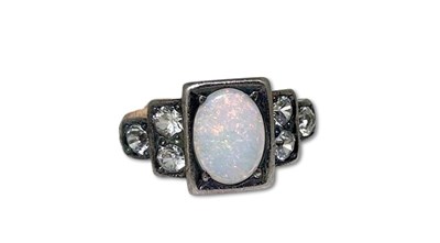 Lot 295 - White Opal and Colourless Sapphire Ring.