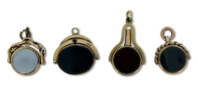 Lot 268 - Four Spinner Fob Charms.