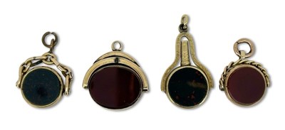 Lot 268 - Four Spinner Fob Charms.