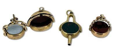 Lot 268 - Four Spinner Fob Charms.