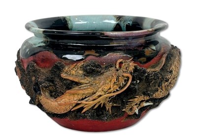 Lot 235 - Oriental Earthenware Dragon Jardiniere.