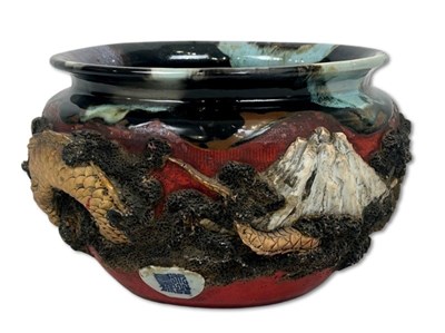 Lot 235 - Oriental Earthenware Dragon Jardiniere.