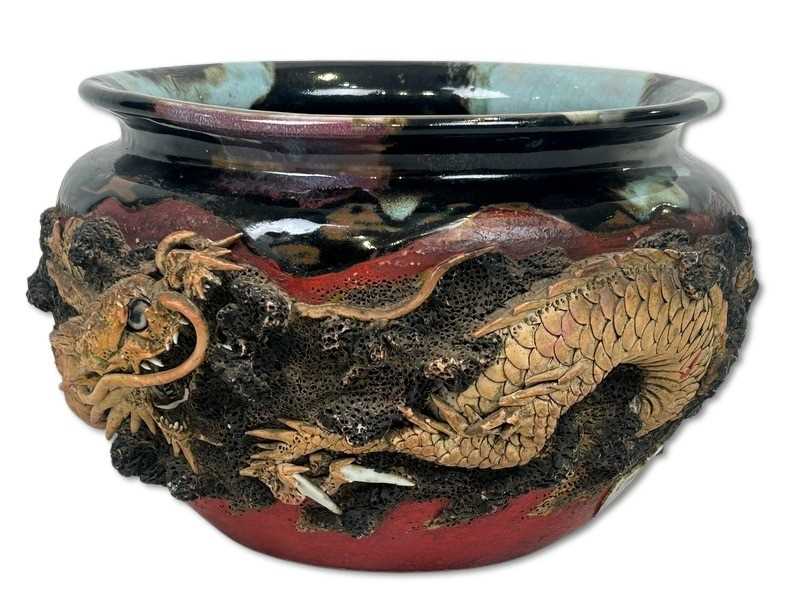 Lot 235 - Oriental Earthenware Dragon Jardiniere.