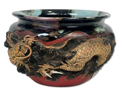 Lot 235 - Oriental Earthenware Dragon Jardiniere.