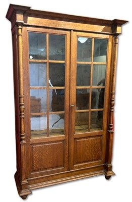 Lot 136 - French Oak Two-Door Glazed Bookcase.