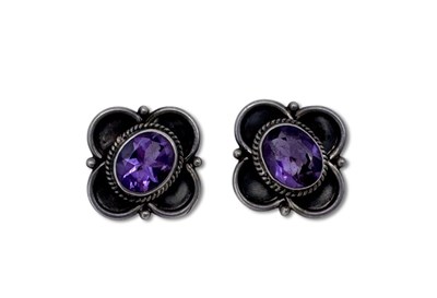 Lot 365 - Arts & Crafts Style Amethyst Studs.