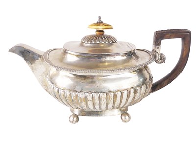 Lot 587 - Large Georgian Teapot in Sterling Silver.