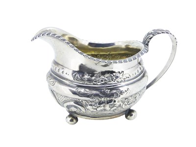Lot 553 - George III Milk Jug.
