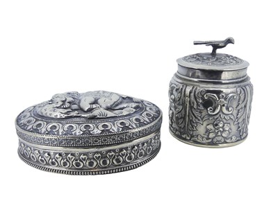 Lot 579 - Two Silver embossed boxes.