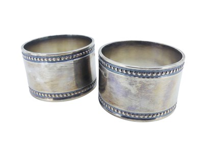 Lot 532 - Two Christofle Napkin Rings.
