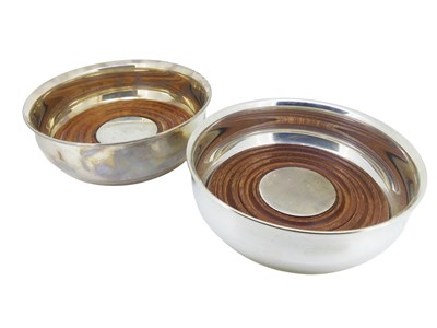 Lot 478 - A Matched Pair of Sterling Silver Tiffany & Co Bottle Coasters.