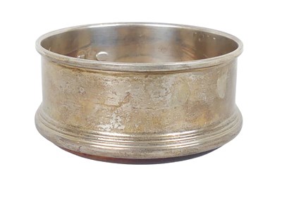 Lot 406 - Wine Bottle Coaster.