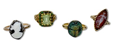 Lot 335 - Four Gem Set Rings.