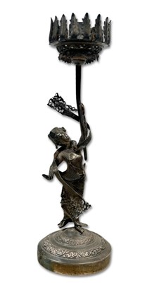 Lot 249 - South East Asian Candlestick.