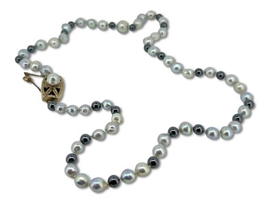 Lot 400 - Pearl and Hematite Strand.