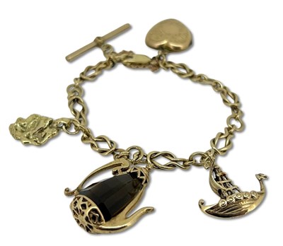 Lot 381 - Yellow Gold Charm Bracelet.