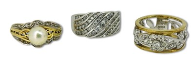Lot 353 - Pearl Ring, Floral Ring and Channel Set Ring.