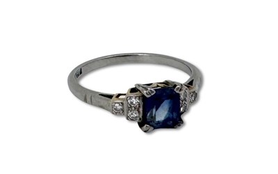 Lot 407 - Diamond Sapphire Ring.