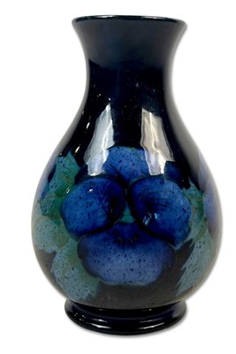 Lot 182 - William Moorcroft Moonlit Blue Pansy Vase.
