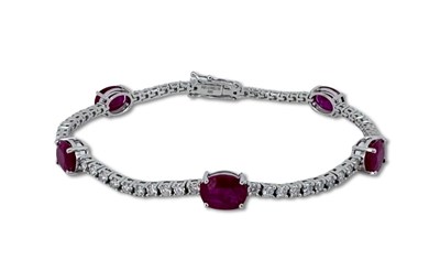Lot 357 - Diamond and Ruby Tennis Bracelet.