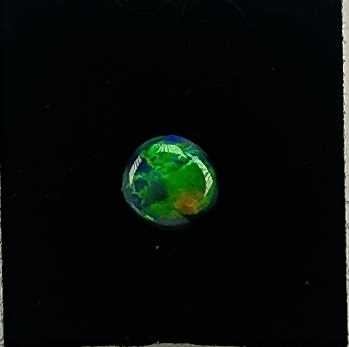 Lot 61 - Black Opal Cabochon.