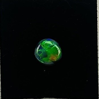 Lot 61 - Black Opal Cabochon.