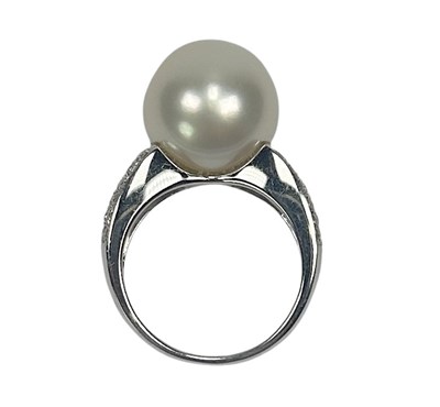 Lot 62 - Pearl and Diamond Ring.