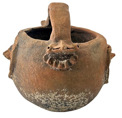 Lot 132 - A Carved Papua New Guinea Raku Fire Pot.