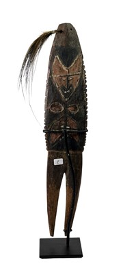 Lot 57 - Sepik River Carved Charm.