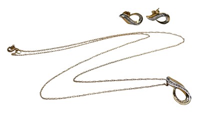Lot 202 - Diamond Earrings and Pendant Set.