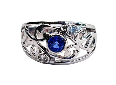 Lot 141 - 18ct Sapphire and Diamond Ring.