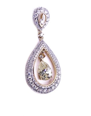 Lot 312 - An Articulated Drop Diamond Pendant.